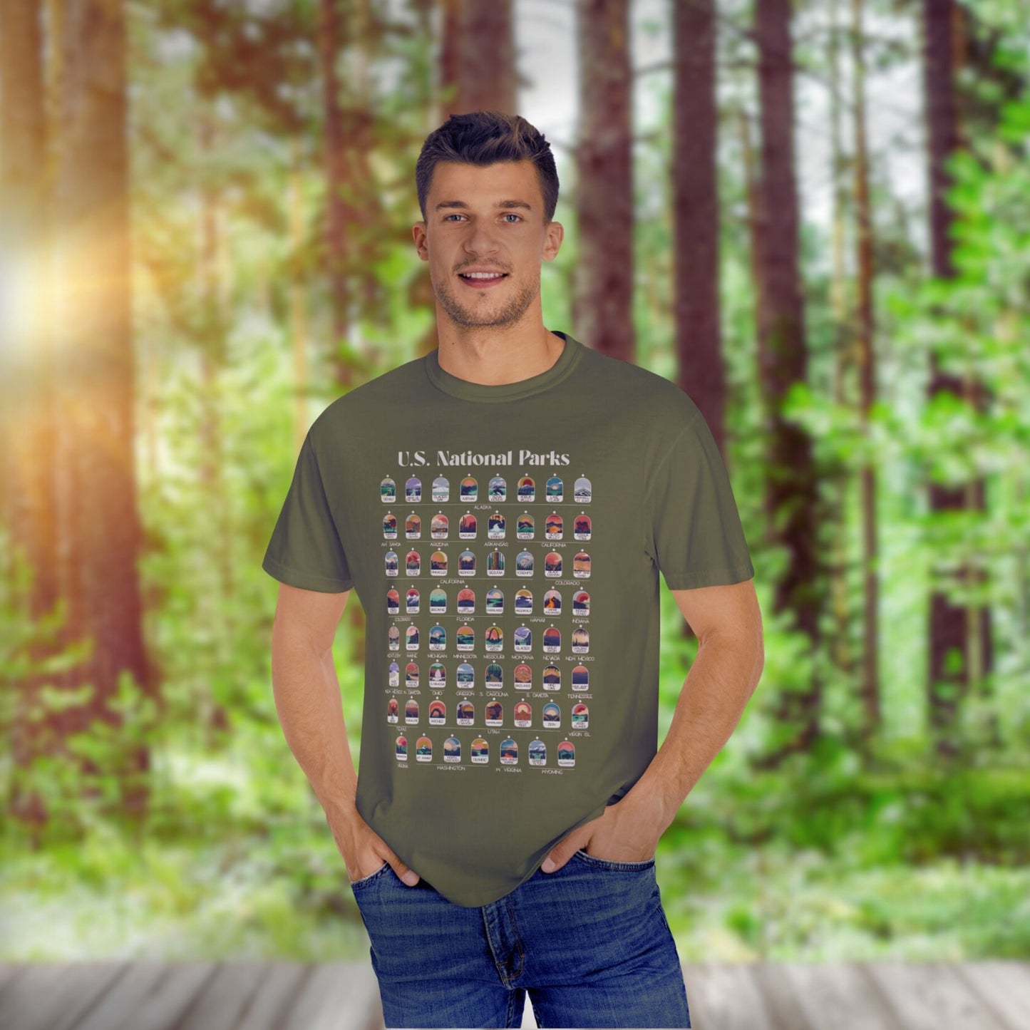 Man wearing Army Green t-shirt with all 63 National Parks on it with circles to fill in to track your National Parks.