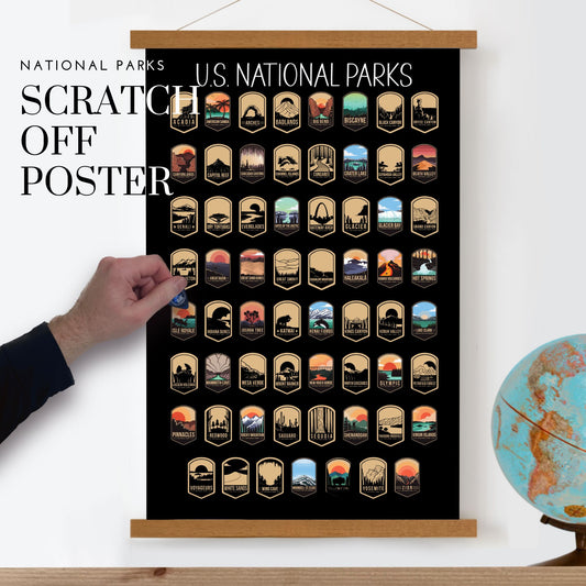 63 National Park scratch off poster, Has a black background with colorful icons for each park. Scratch off a gold layer to reveal artwork. Hanging on a wooden frame.