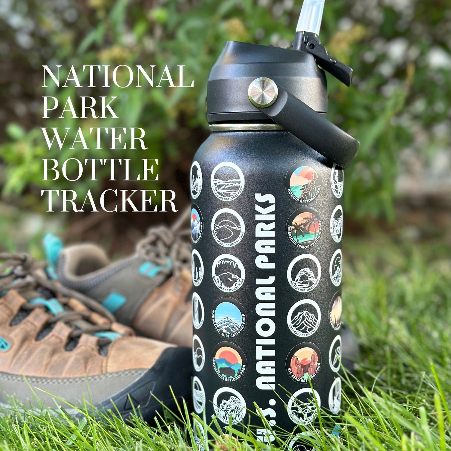 National Parks Tracker Water Bottle with Stickers in an outdoor setting with hiking boots next to the bottle.